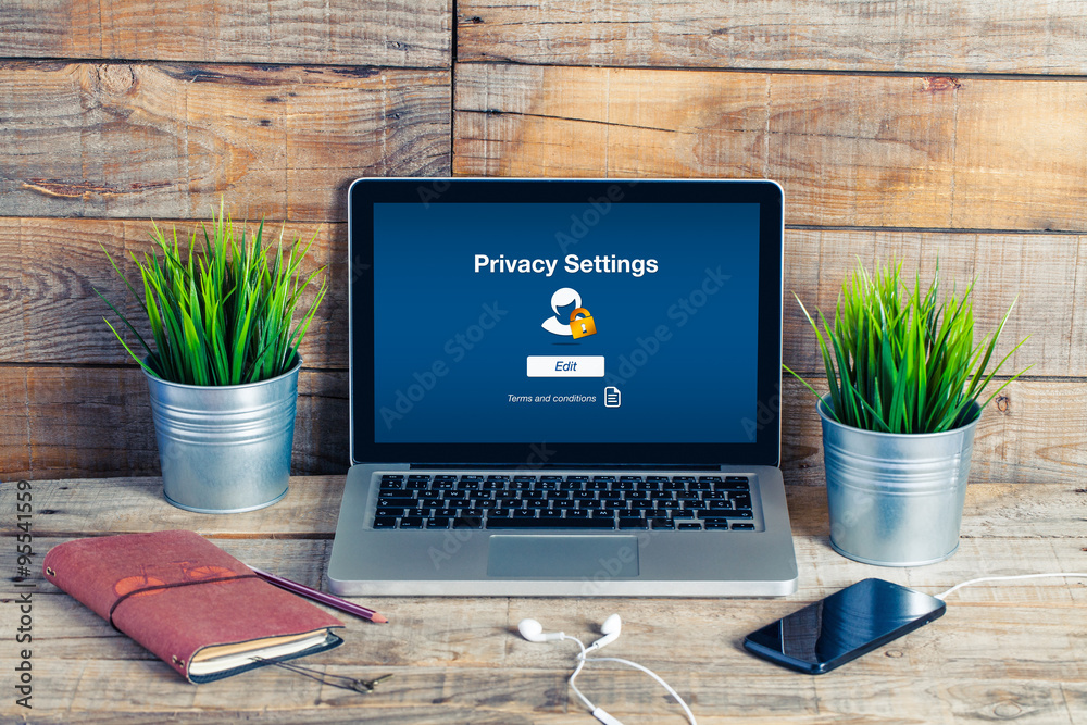 Privacy settings in a laptop screen. Workplace setting. - obrazy, fototapety, plakaty 