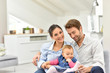 © goodluz - Portrait of happy family at home
