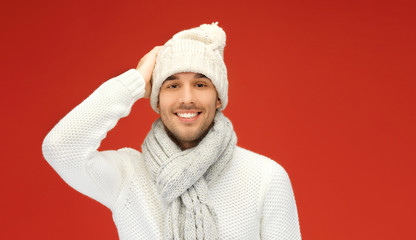 Canvas Print - handsome man in warm sweater, hat and scarf