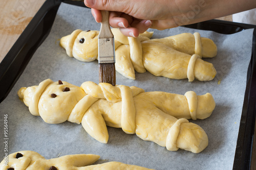 Unbaked Traditional Man Shaped Bread Prepared For St Nicholas Day In German Speaking Countries Being Brushed With Egg Yolk Buy This Stock Photo And Explore Similar Images At Adobe Stock Adobe Stock