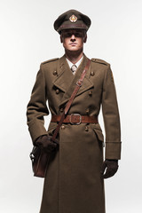 Wall Mural - Military uniform fashion man against white background.