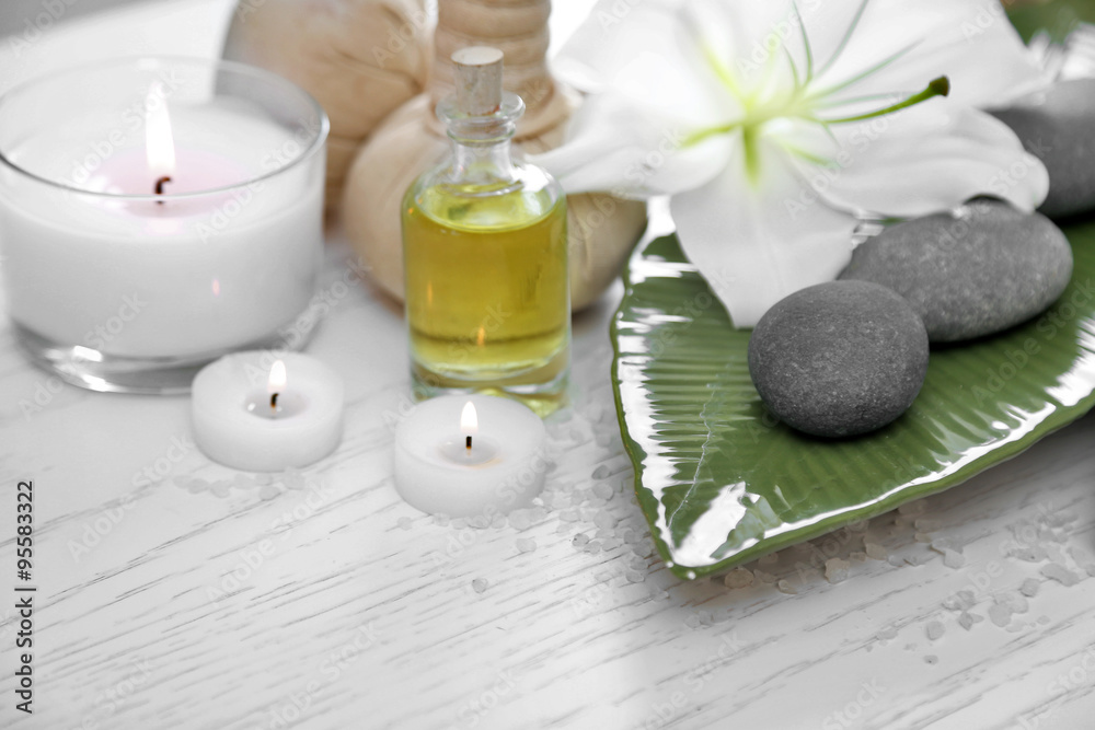 Beautiful composition of spa treatment on wooden table