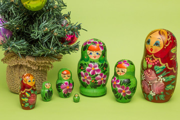 Wall Mural - Russian wooden dolls around a Christmas tree