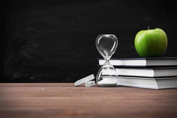 School equipment on blackboard background