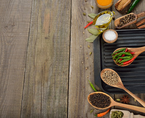 Wall Mural - Frying pan, spices and seasonings