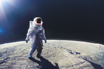 Wall Mural - astronaut walking on the moon