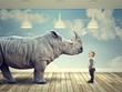 © tiero - rhinoceros and kid