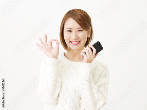 スマートフォンを持つ女性 Okサイン Buy This Stock Photo And Explore Similar Images At Adobe Stock Adobe Stock スマートフォンを持つ女性 Okサイン Buy This Stock Photo And Explore Similar Images At Adobe Stock Adobe Stock