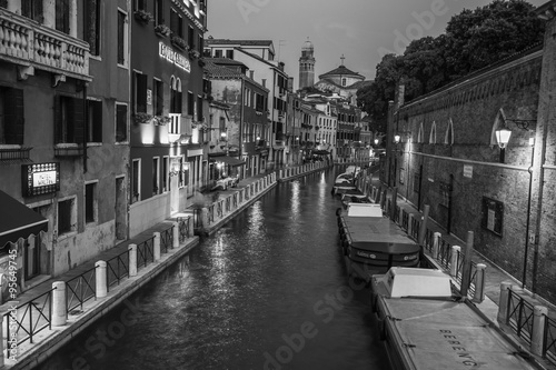 Naklejka na szybę Narrow canal among old colorful brick houses in Venice