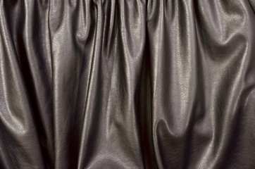 Wall Mural - Close up on crumpled black leather material textured fabric. 