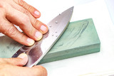 Fototapeta Dziecięca - Honing Chef Knife/Close up of hand working Japanese chef knife 