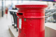 © IRStone - LONDON, UK - SEPTEMBER 14, 2015:  Royal mail red post box in Canary Wharf