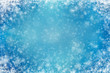© nadianb - Light blue background with snowflakes