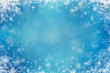 © nadianb - Light blue background with snowflakes