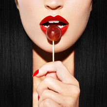 Sexy Woman With Red Lips Holding Lollipop
