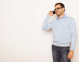 Young business man using mobile phone