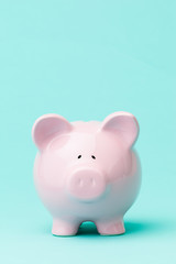  Piggy bank on blue background