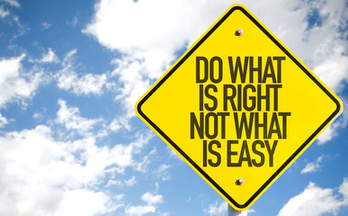 Do What Is What Not What Is Easy sign with sky background