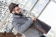 © Marino Bocelli - young hipster businessman looking in his shoulder bag