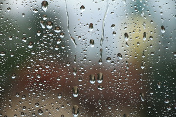 rain drops on window , rainy day