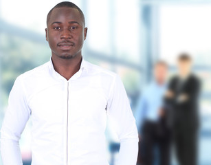 Wall Mural - Happy black business man with people in the background