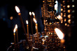© EdNurg - Candles burn in Church