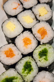 Fototapeta Kwiaty - Sushi rolls on a plate