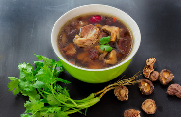 stew of pork and herbal soup, ba kut teh on black background