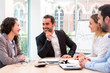 © Production Perig - Boss heading a business reunion with partners