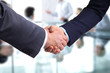 © lenetsnikolai - Business handshake. Two businessman shaking hands with each other in the office