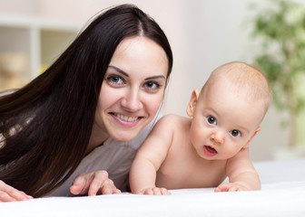 Portrait of happy mother and baby