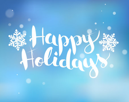 Brush  lettering on a blue background with snowflakes Happy Holidays. Vector.