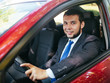 © davit85 - Handsome young man driving a car.