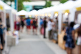 Fototapeta Zachód słońca - Blurred background : people shopping at market in holiday, blur background with bokeh.