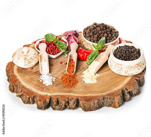 Naklejka na szybę Spices and seasonings on a wooden background