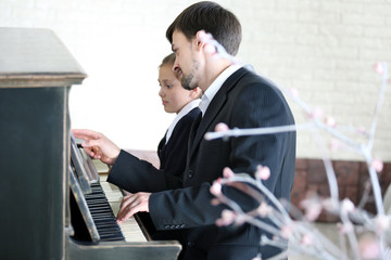 Poster - Musician teacher trains to play piano little girl