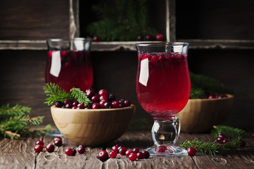 Fresh red cranberry juice on the vintage table