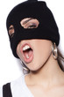 Anger girl in balaclava - crime and violence