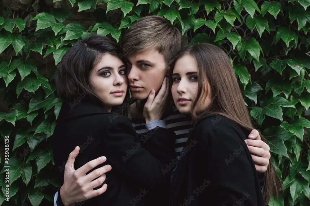 Foto Love triangle of two women, one man passion of love and hate