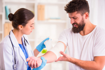 Wall Mural - Injury man in doctor