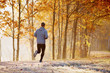 © baranq - Man running at morning in the park