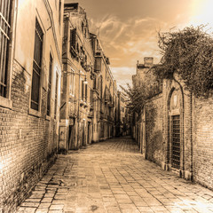 Wall Mural - picturesque backstreet in Venice in sepia tone