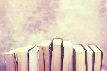 Poster - Series books at concrete background