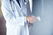 Doctor Handshake With A Patient