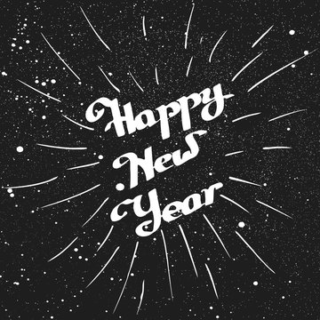 Hand-written Happy New Year with ink beam