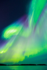 Wall Mural - Northern lights (Aurora borealis) in the sky