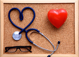 Medical stethoscope on a background of cork panels