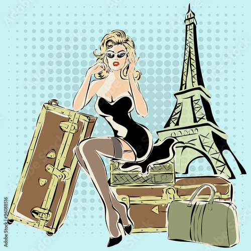 piekna-pin-up-kobieta-siedzi-na-walizkach-w-poblizu-wiezy-eiffla-w-paryzu