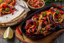 Pork Fajitas With Onions And Colored Pepper, Served With Tortill