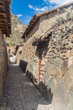 One of ancient alleys of Ollantaytambo village, Sacred Valley of Incas, Peru